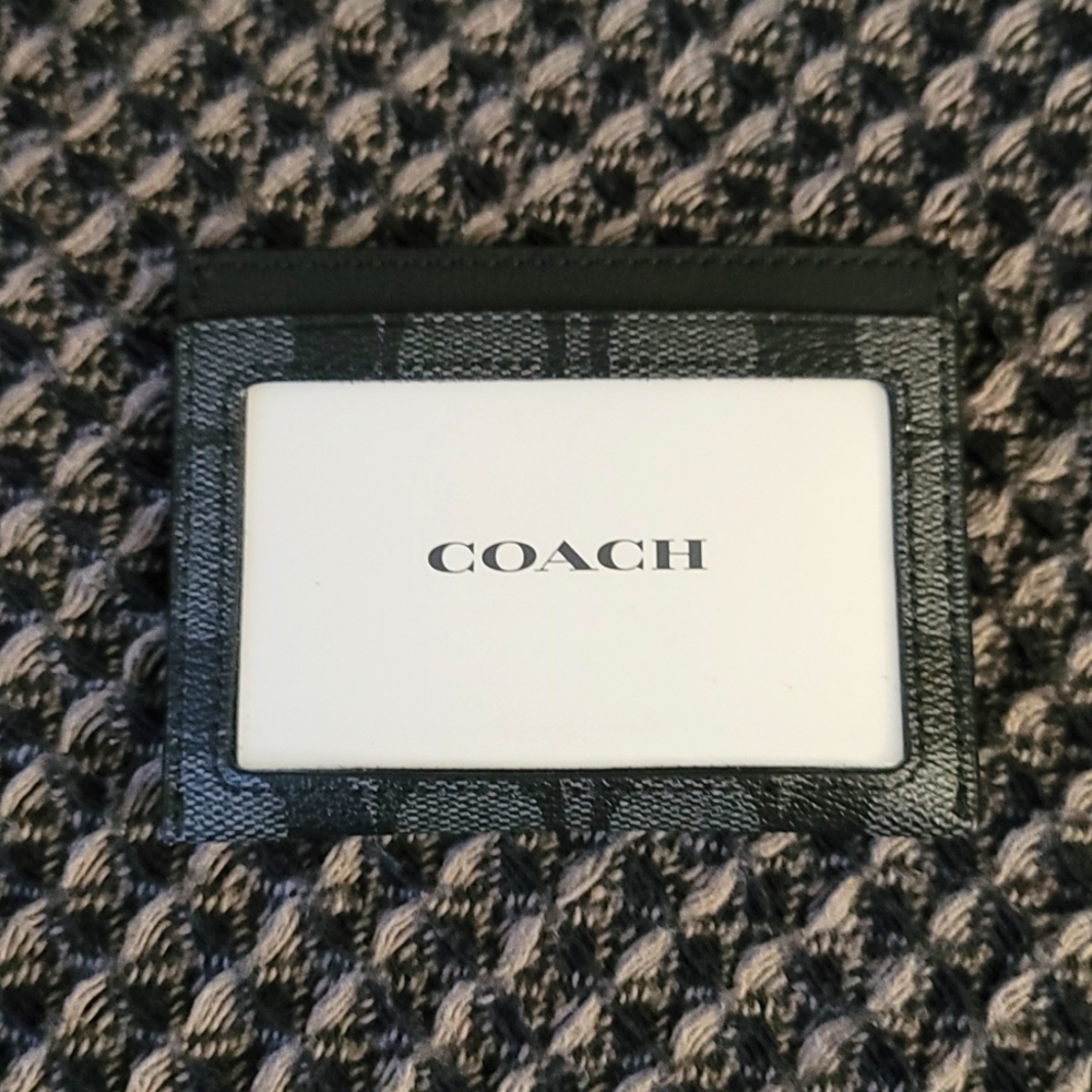 Coach slim card holder in Signature canvas with leather details And trim.